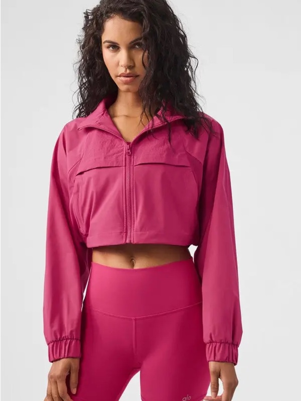 Alo Yoga Cropped Playmaker Jacket in Pink Summer Crush